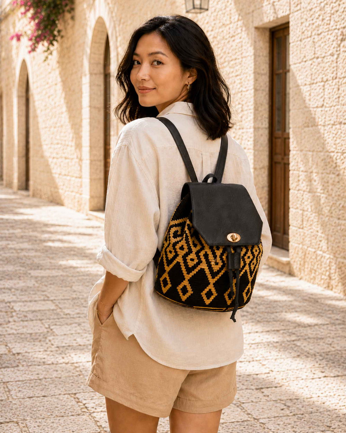 Maresa Black & Camel Wayuu Crochet Flap Backpack lifestyle image