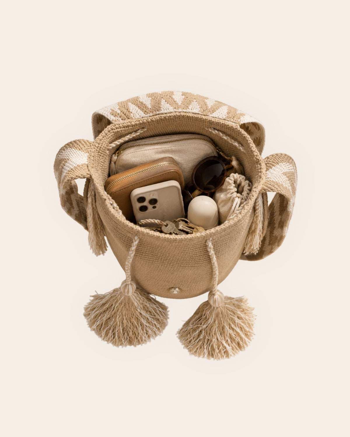 Interior capacity of Sand & Ivory Wayuu crochet artisan flap bucket bag