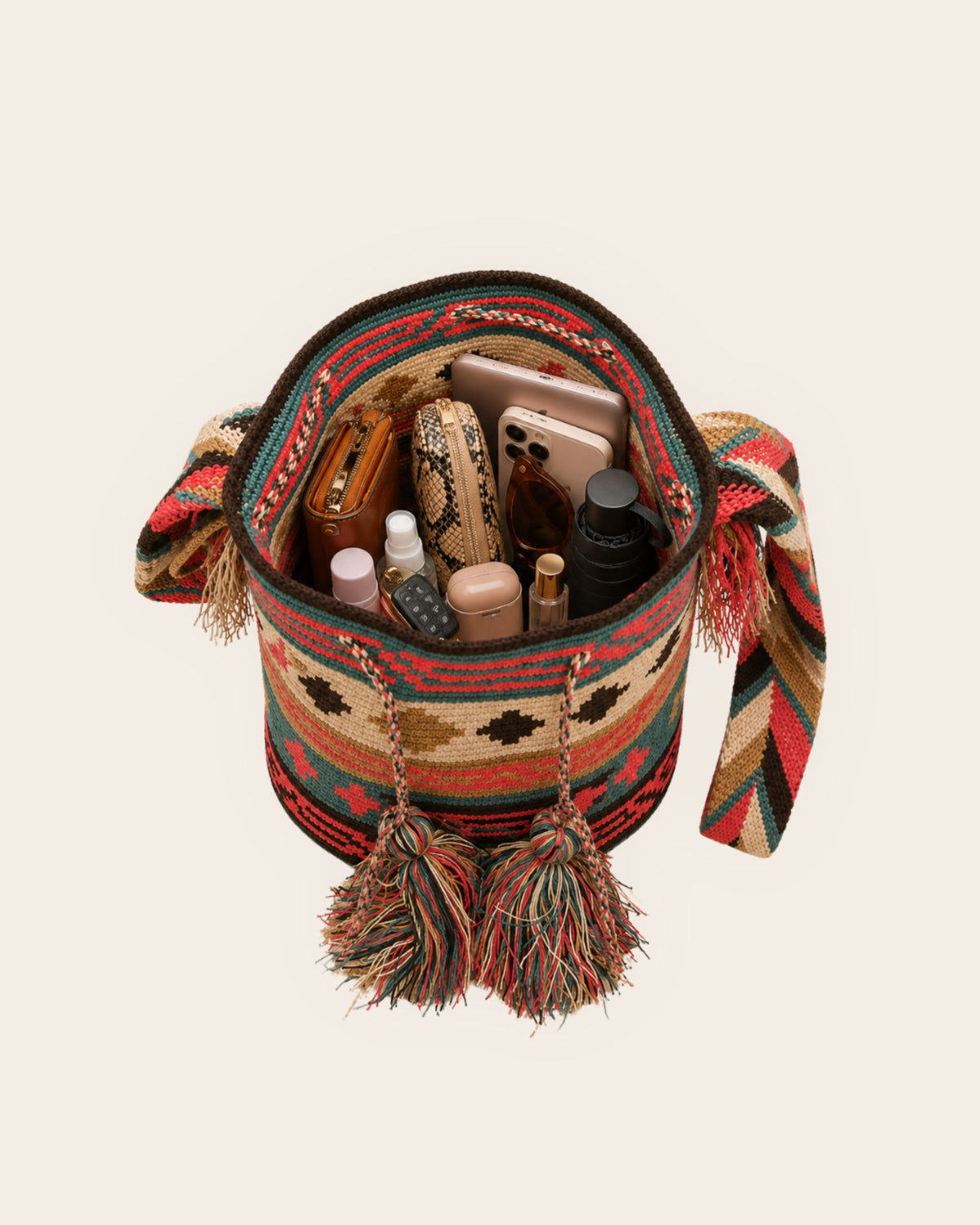 Handcrafted tassel and crochet detail on the Coral Oasis Wayuu Classic Mochila