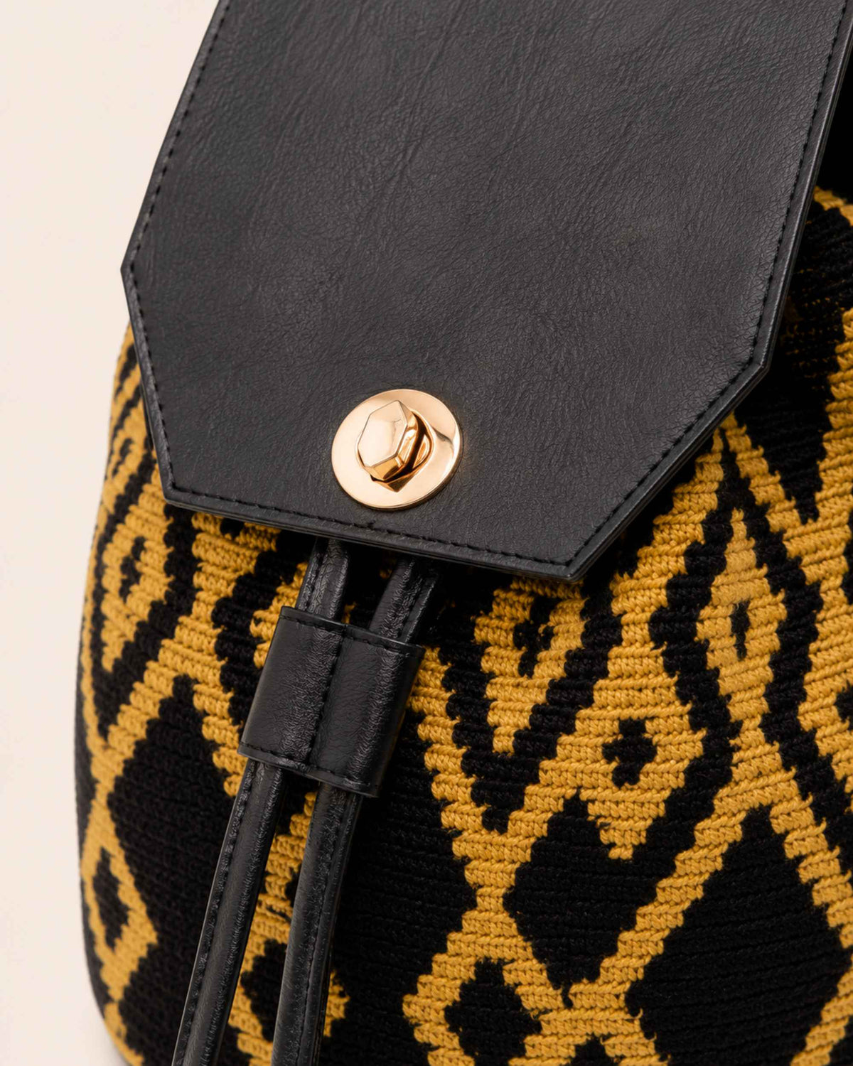 Interior of Maresa Black & Camel Wayuu Crochet Flap Backpack