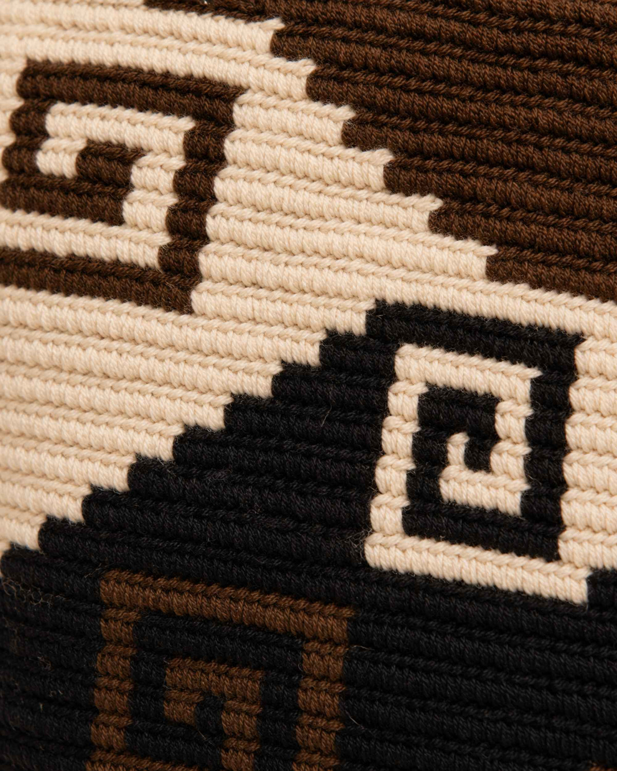 Side profile of Maresa Sierra Wayuu Crochet Flap Backpack