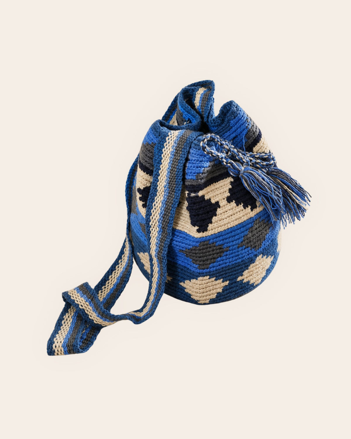 Side profile of the Cobalt Blue Wayuu Crochet Mini Mochila