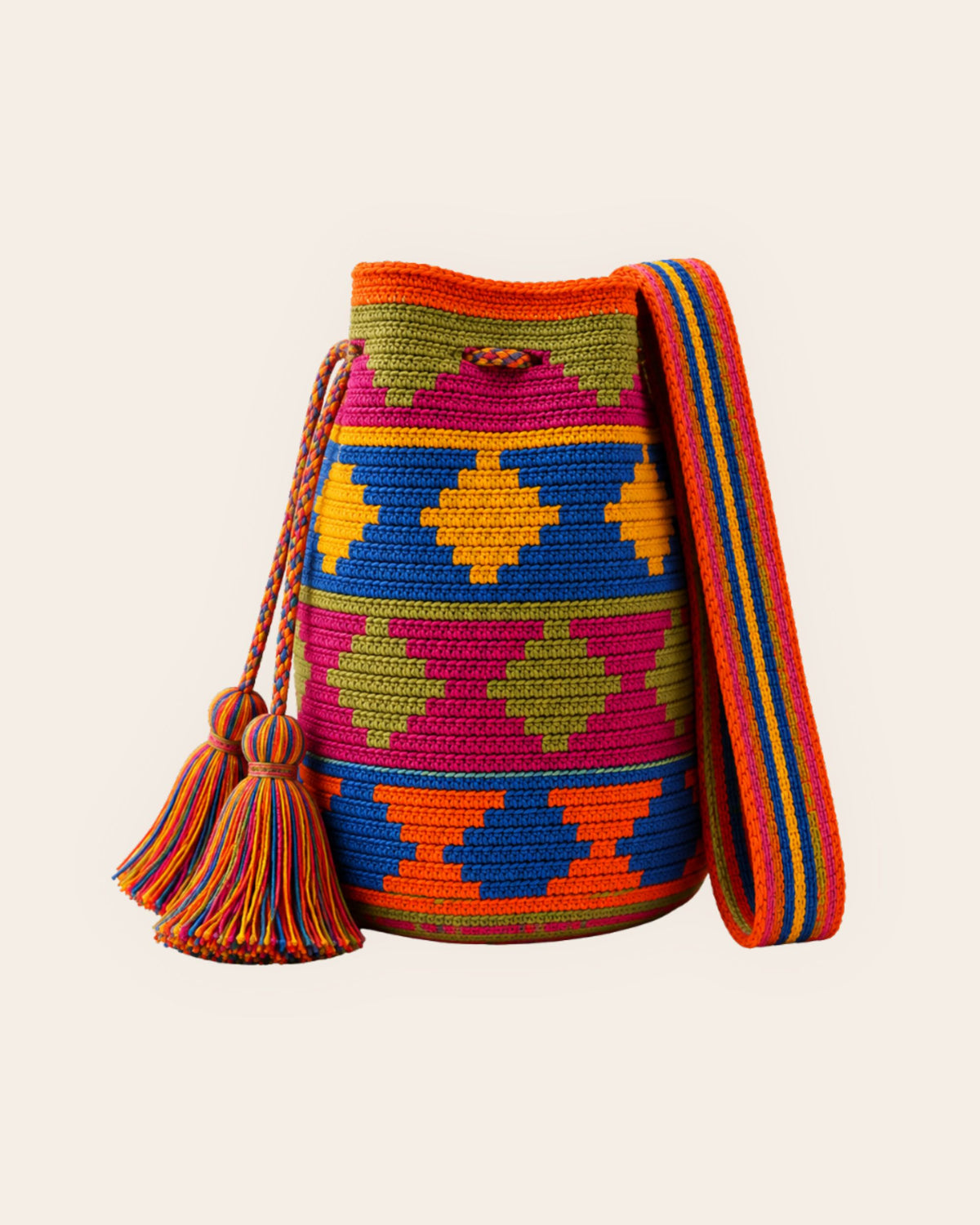 Side profile of the Maresa Orange, Blue & Fuchsia Wayuu Crochet Mochila.