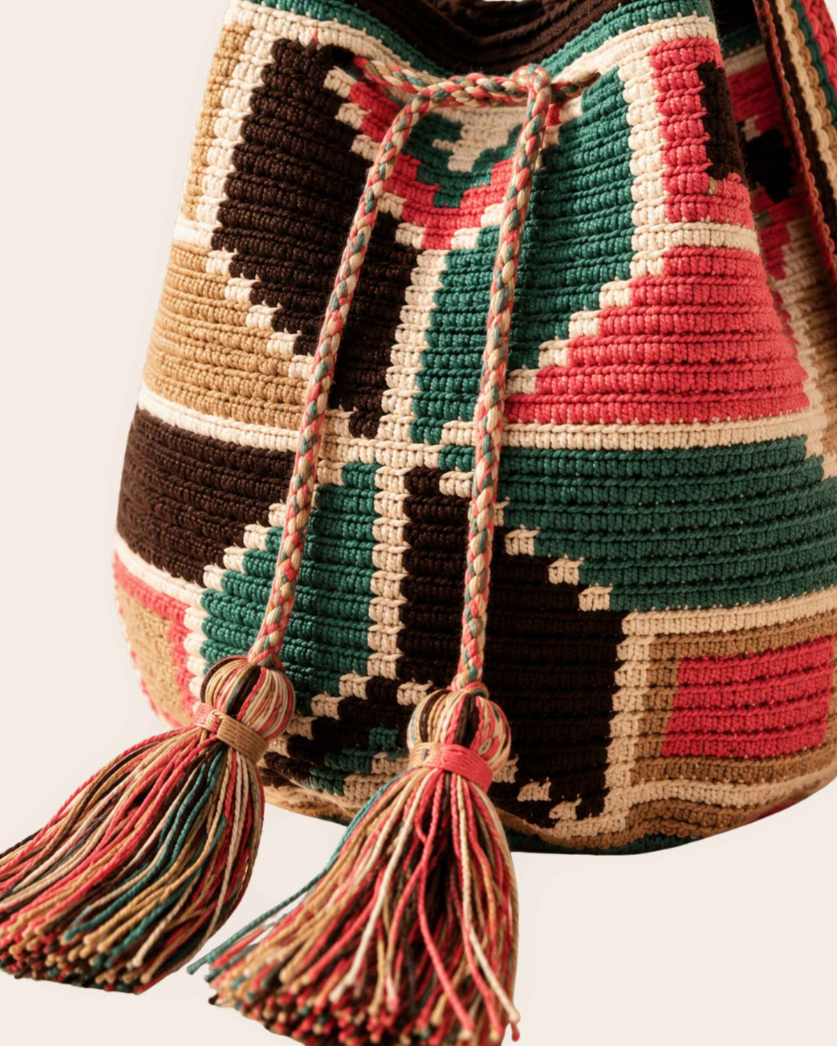 Close-up of the mosaic-inspired Wayuu crochet pattern and handmade tassels