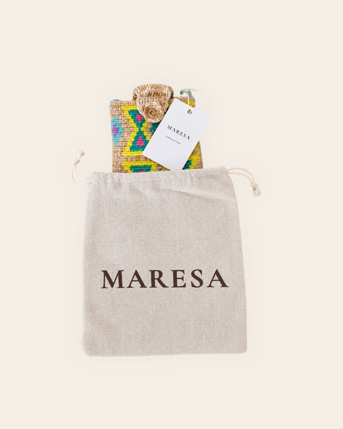 Maresa handmade mini crossbody bag with branded hang tag and cotton dust bag