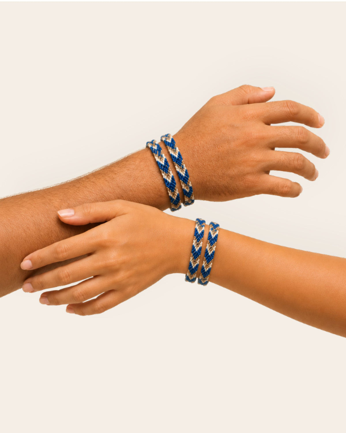 Maresa Navy and Sand handmade Wayuu woven bracelet with geometric pattern worn on the wrist 