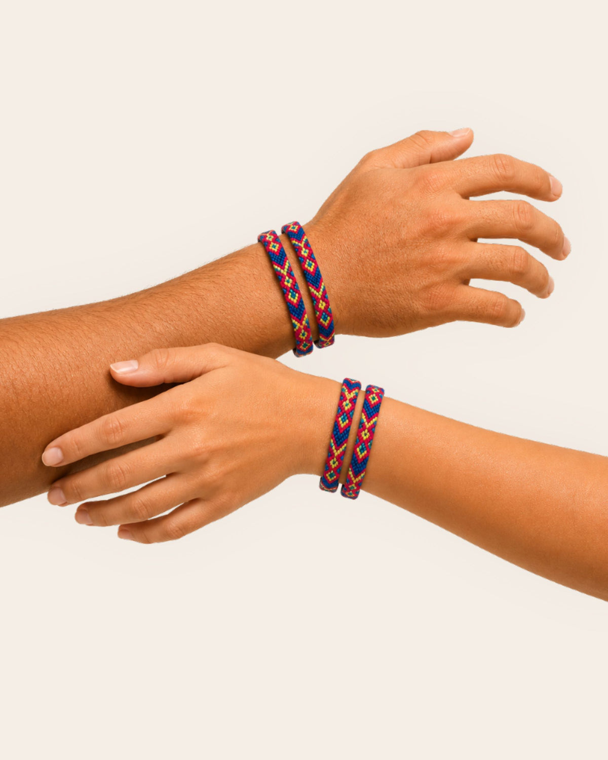 Maresa Fuchsia and Cobalt handmade Wayuu woven bracelet with colourful geometric pattern worn on the wrist 