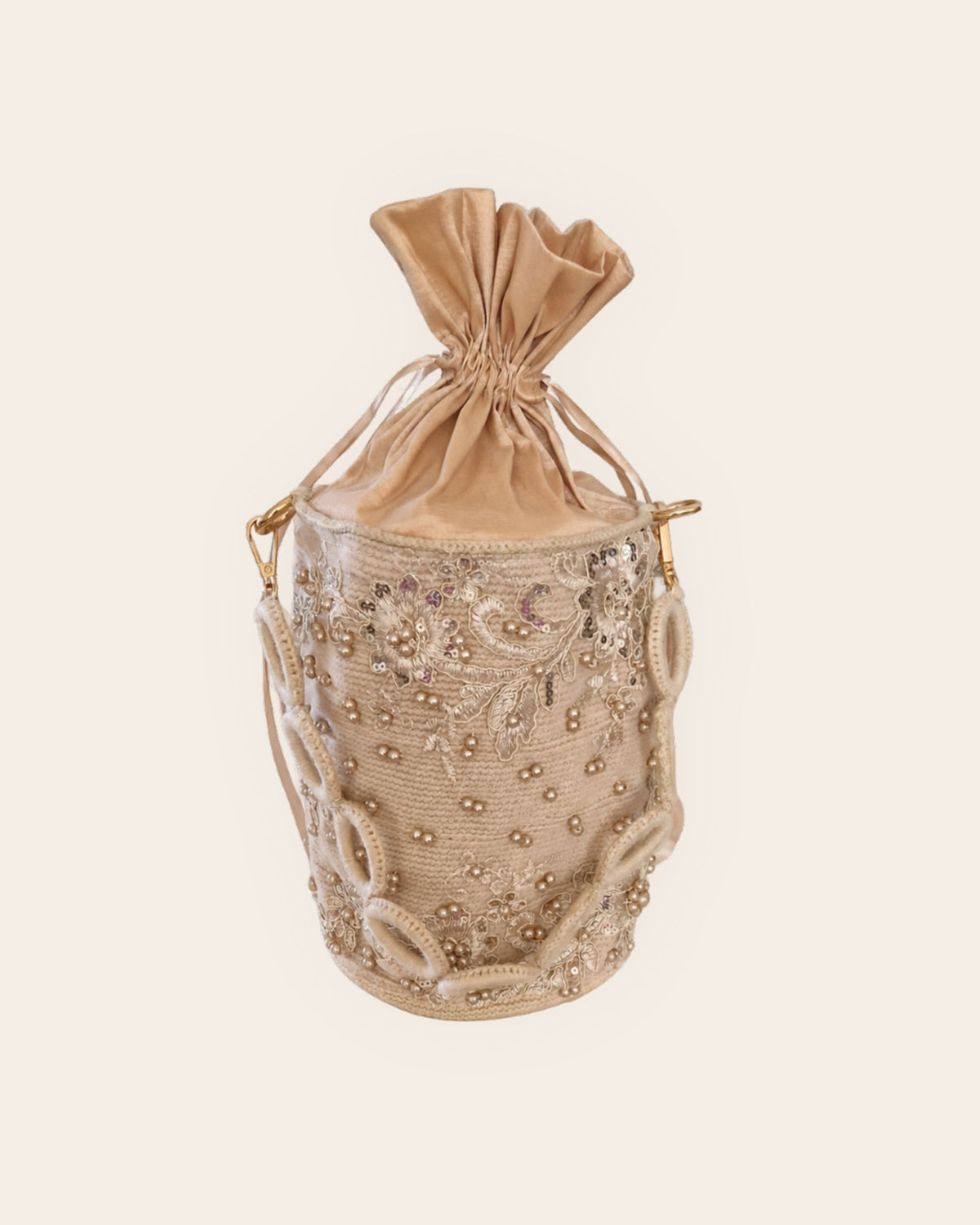 Champagne floral pearl-embellished handmade occasion bag with circular crochet strap 