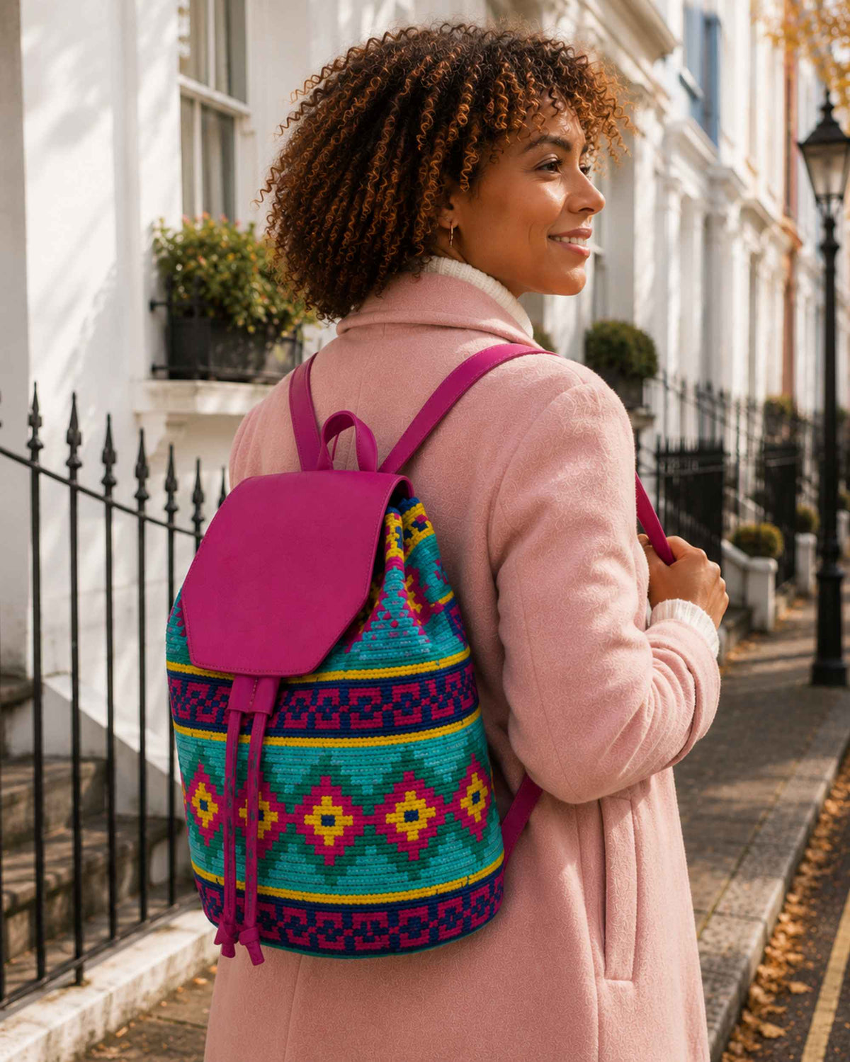 3.	Maresa Fuchsia & Turquoise Wayuu Crochet Flap Backpack autumn lifestyle 