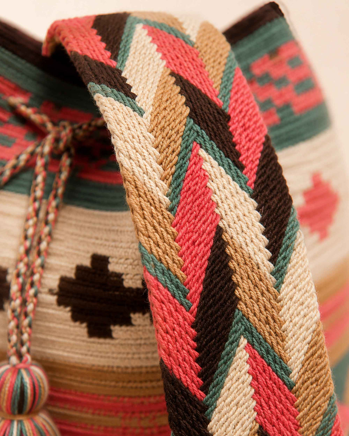 Handwoven geometric strap detail of the Coral Oasis Wayuu crochet Classic Mochila