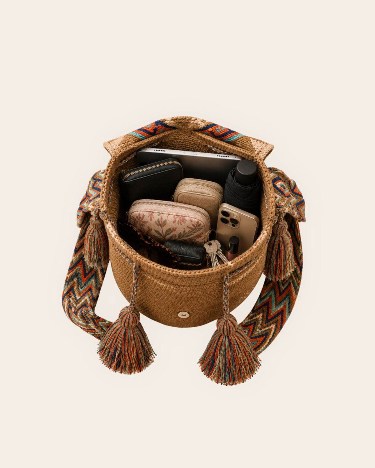Interior capacity of Camel Multi Wayuu crochet artisan flap bucket bag