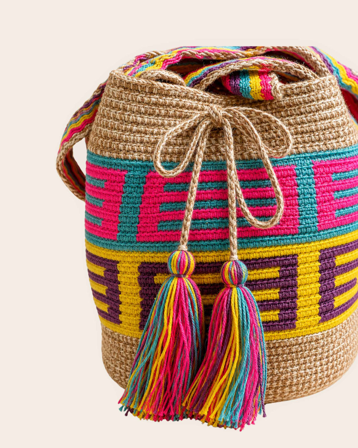 Close-up of the geometric Wayuu crochet pattern and handmade tassels