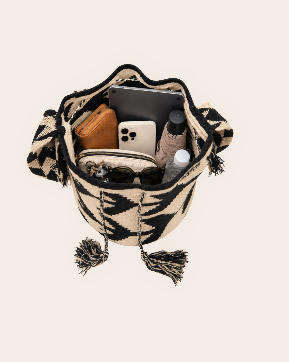 Interior capacity of the Maresa Sand & Black Wayuu Crochet Classic Mochila 