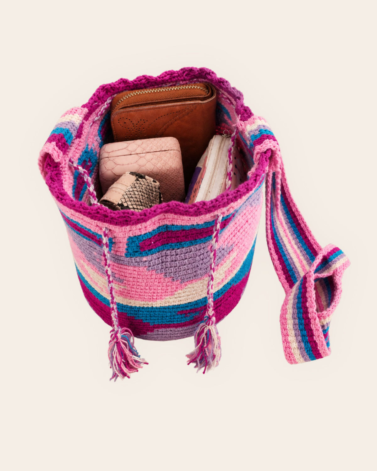 Interior capacity of the Maresa Orchid Lagoon Wayuu Crochet Mochila.
