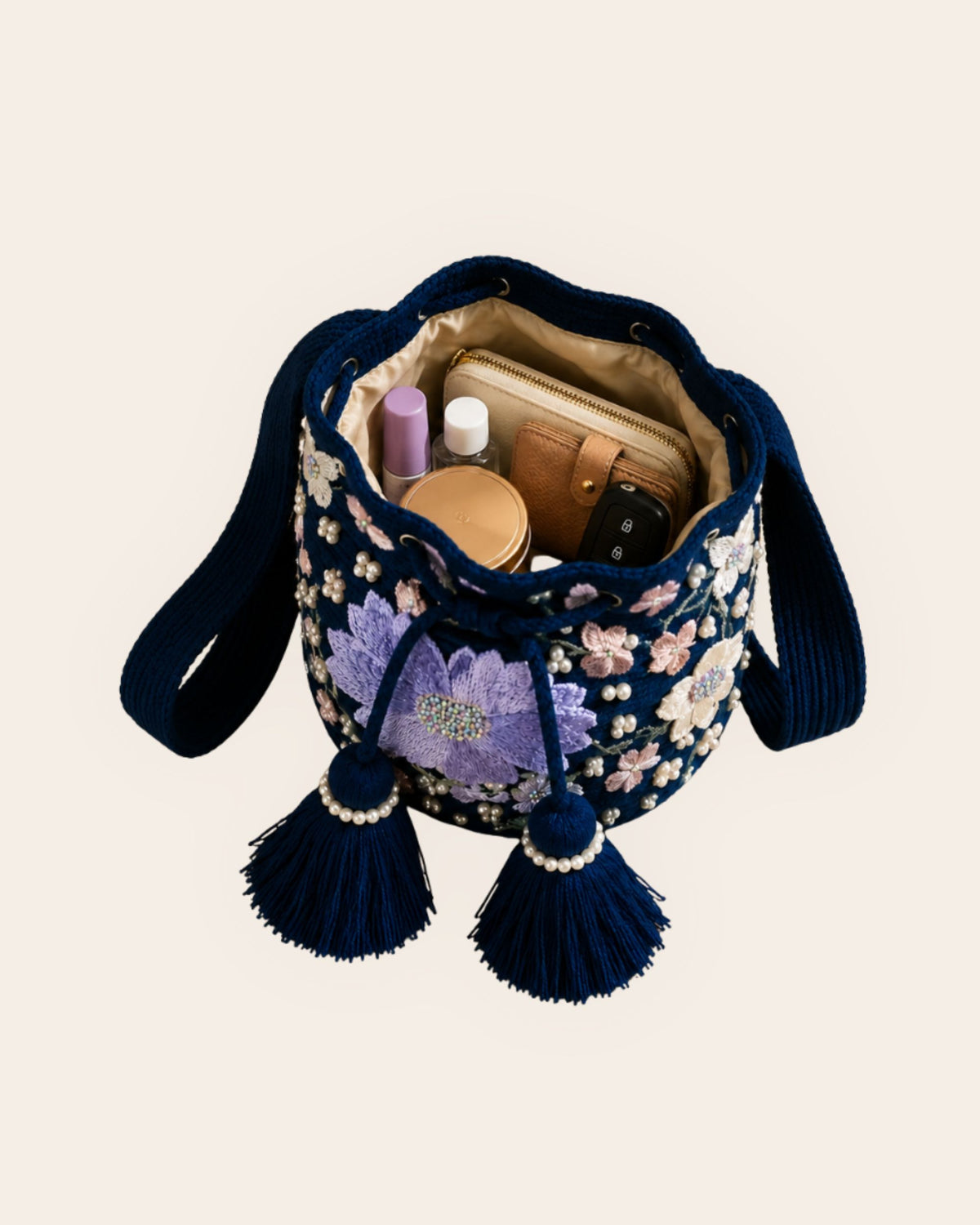 Open Midnight Bloom occasion bag showing satin-lined interior, slip pocket and space for everyday essentials. 