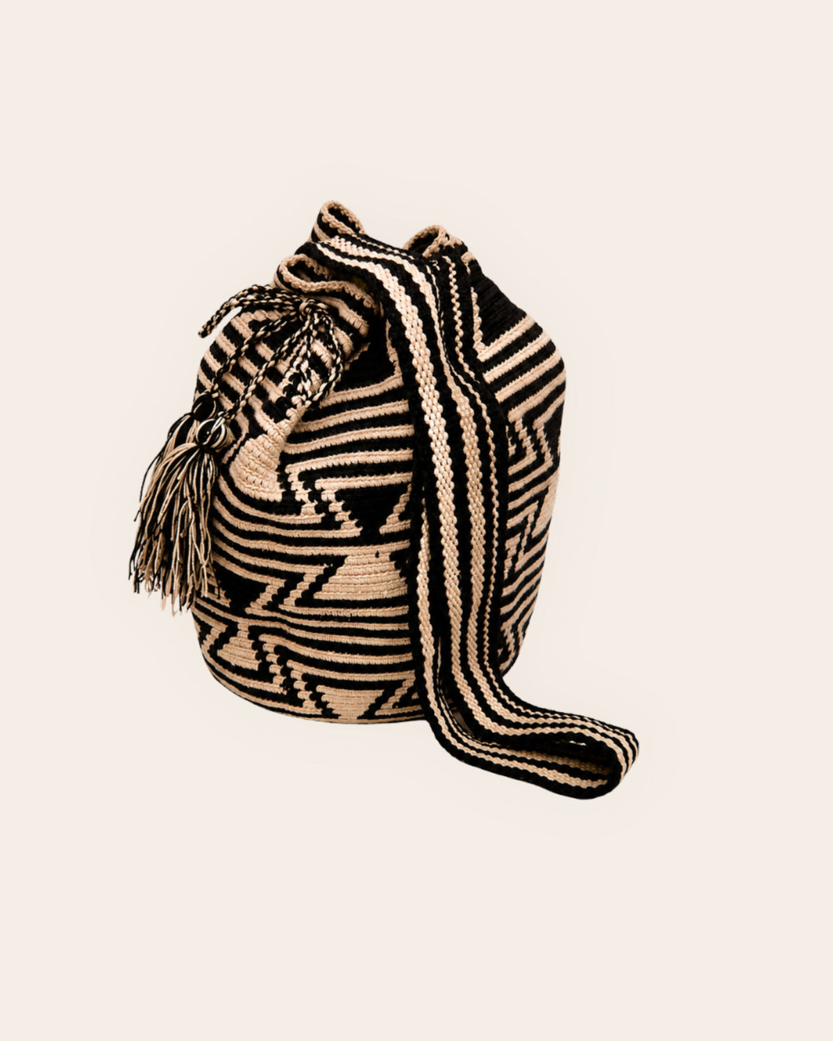 Side view of Sand and Black geometric Wayuu Crochet Classic Mochila