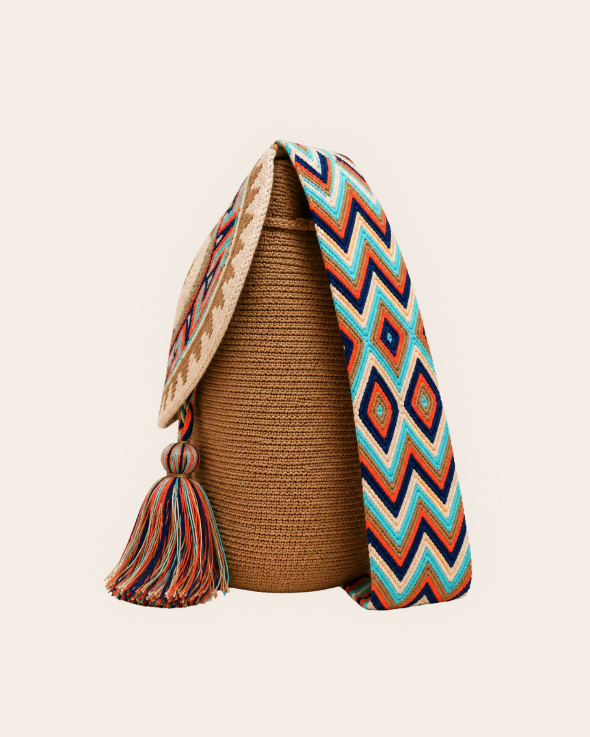 Side profile of Camel Multi Wayuu crochet artisan flap bucket bag