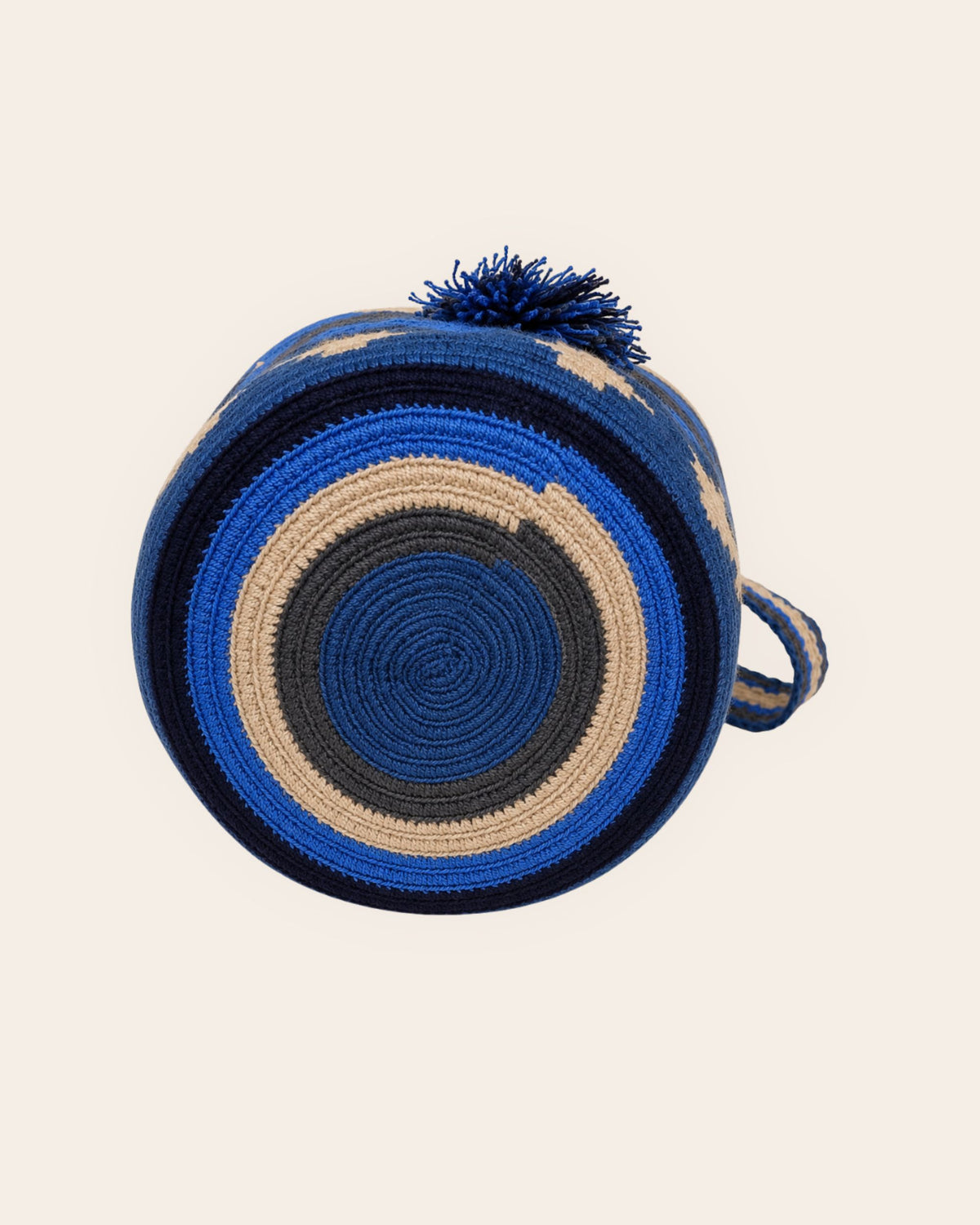 Circular handmade crochet base of the Cobalt Blue Wayuu Crochet Mini Mochila